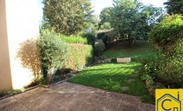 Photo F4 avec jardin et parking