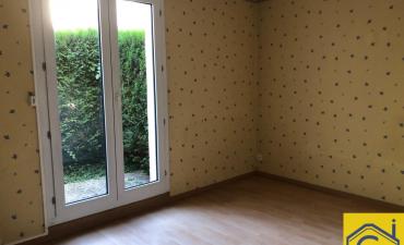 F2 avec jardin et parking