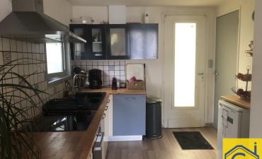 F2 avec jardin et parking